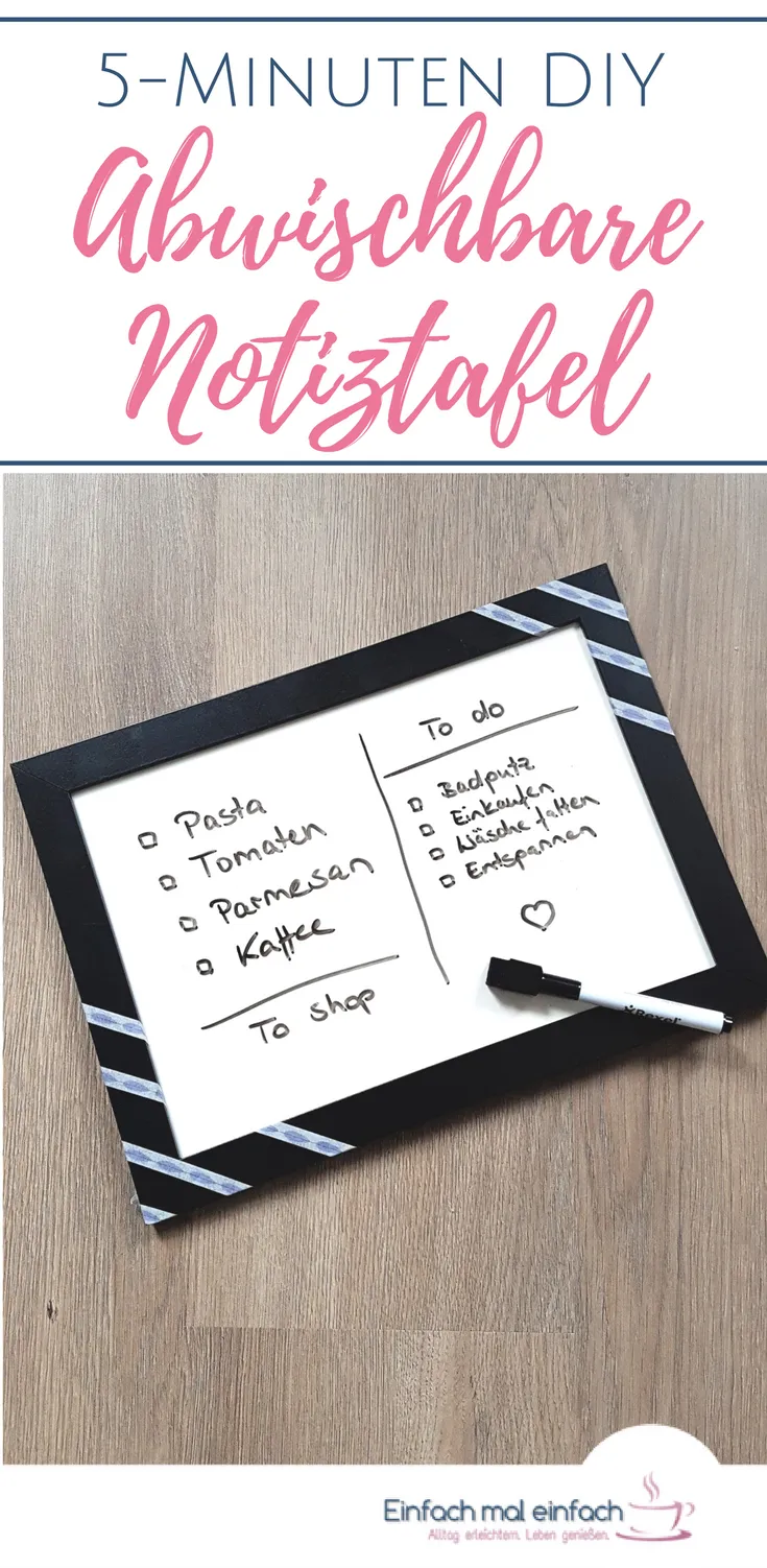 Notiztafel aus Bilderrahmen mit Stift auf Holzuntergrund. Text: